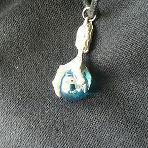 Silver claw foot with blue ball